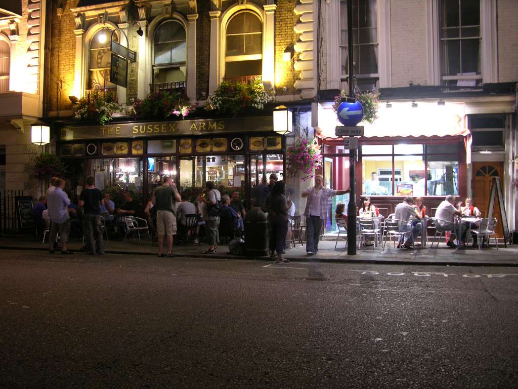 London 01 17 Pub Visiting a pub is one of the delights of visiting London. The locals and tourists mix, spilling onto the street as we enjoy a pint. And just next door is a fish�n� chip shop. Yummy.